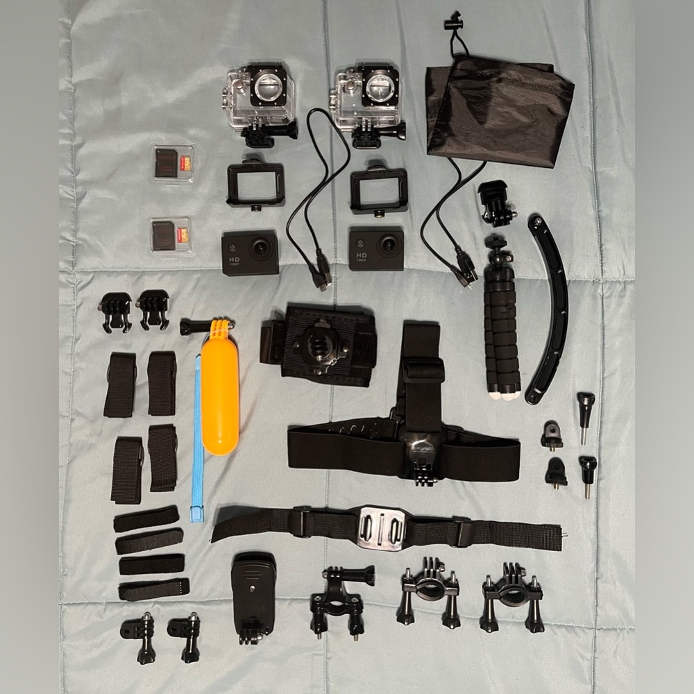 2 brand new, never used action cameras with accessories